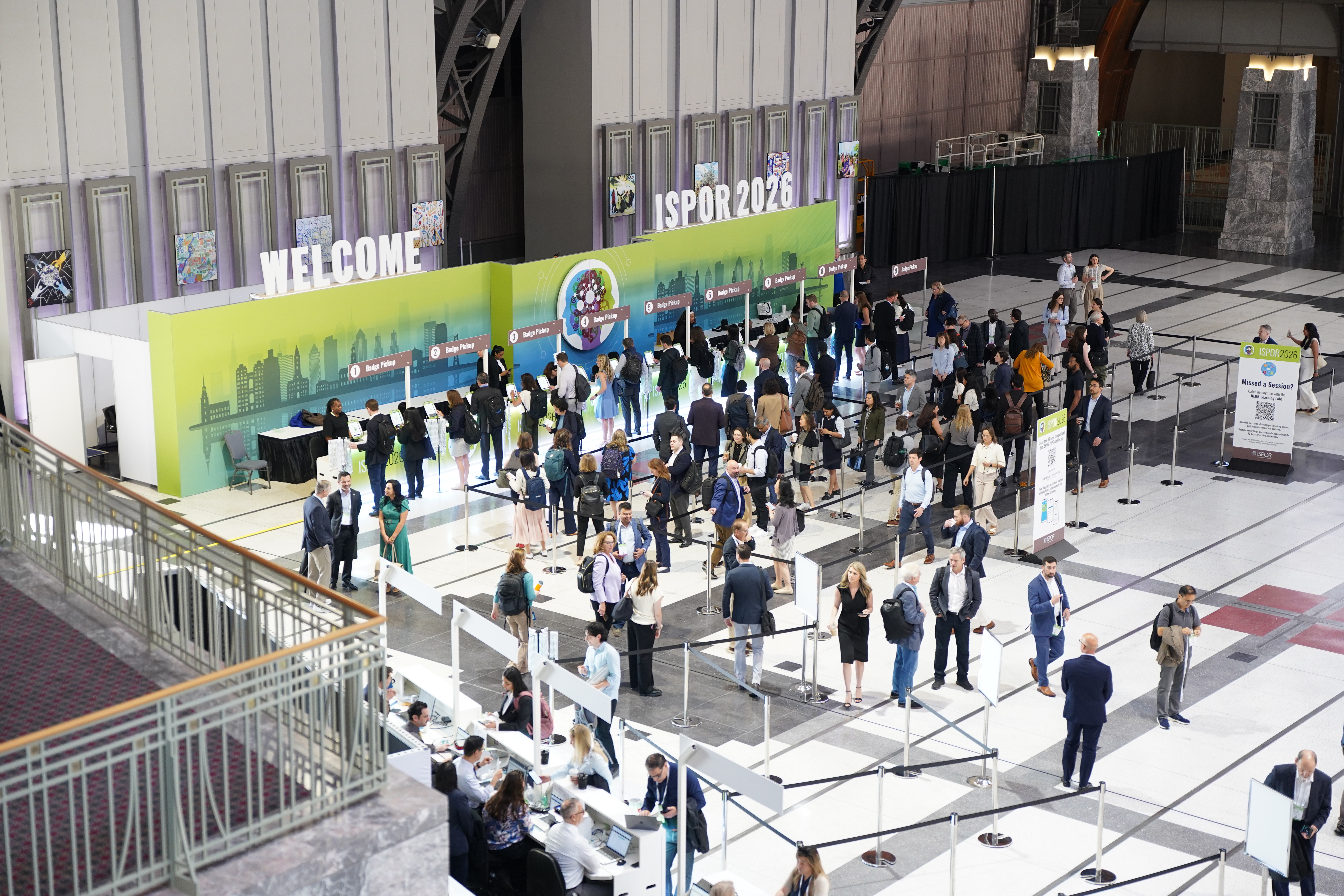 ISPOR 2026 Registration Desk with attendees registering